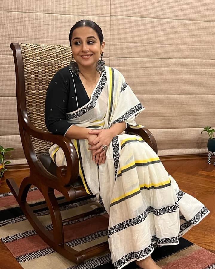 Vidya looked stunning in a rich classic cream and black striped saree, with a floral border design. She opted for a minimal makeup look and a black bindi.