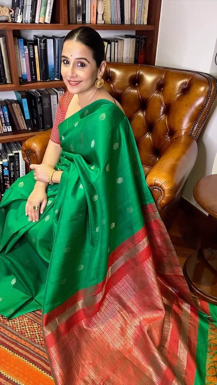 She looked beautiful in a bottle green silk saree with a classic red blouse, creating a stunning contrast.