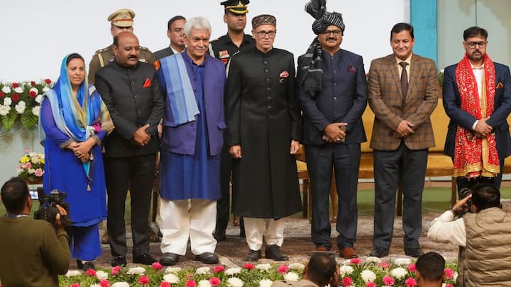 Surinder Kumar Choudhary took oath as Abdullah's deputy. Javed Dar, Sakina Itoo, Javed Rana and Satish Sharma also took the oath in Abdullah's Cabinet at the Sher-i-Kashmir International Conference Centre in Srinagar. Image: PTI