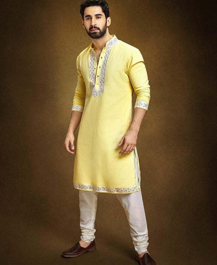 Lakshya embraces the festive spirit with a yellow embroidered kurta, paired with white pajamas and brown juttis.