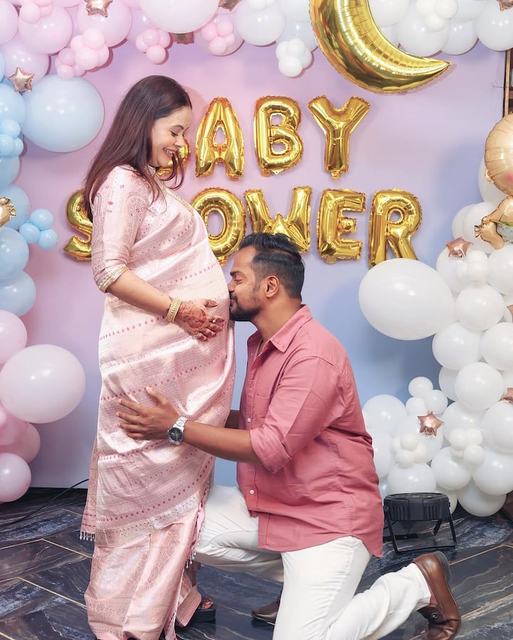 She also shared a sweet photo with her husband, captioning it, “We can barely wait for my little partner in crime.”