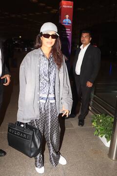 'पाणी' की स्क्रीनिंग के बाद अमेरिका लौटीं Priyanka Chopra, कॉर्सेट-कैप में दिए एयरपोर्ट पर पोज, देखें तस्वीरें