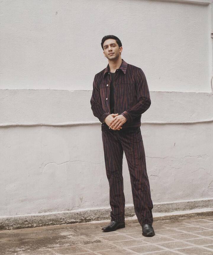 Vedang turned heads in a brown striped jacket with matching pants by Paul Smith.