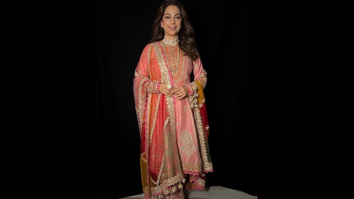 4. Vibrant Peach Attire: This gorgeous peach outfit showcases Juhi's elegant style. Featuring rich gold embroidery, ornate detailing and layered elegance, this attire reflects her passion and is perfect for a magical Diwali night. (Image Source: Instagram/@iamjuhichawla)