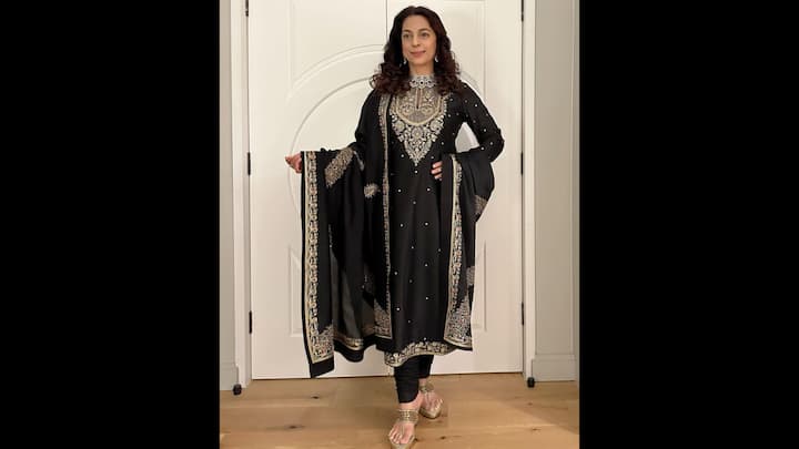 6. Elegant Black Kurta Set: Juhi Chawla exudes regal glamour in her black kurta with intricate gold embroidery. The dupatta with a beautiful border adds a sophisticated touch, making it the perfect outfit for an evening Diwali celebration. (Image Source: Instagram/@iamjuhichawla)