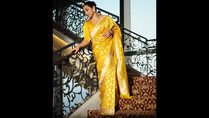 6. Yellow Silk Saree: Vidya Balan's vibrant and yellow silk saree goes extremely well with the Diwali celebrations because of it gold detailing work. It's a traditional drape and is ideal for family gatherings and puja ceremonies. The look radiates warmth and elegance. (Image Source: Instagram/@balanvidya)