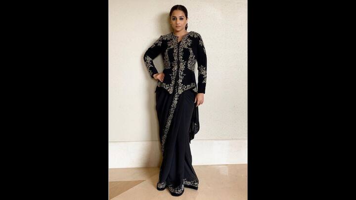 2. Black Embroidered Outfit: Vidya Balan has paired her black saree with a black jacket with intricate floral embroidery. Her look blends traditional elegance with a modern touch. This is a chic and sophisticated look that's ideal for Diwali celebrations this year. (Image Source: Instagram/@balanvidya)