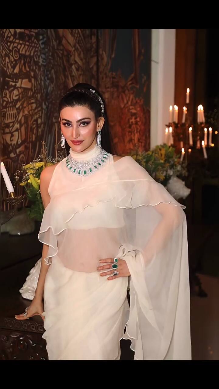 Shalini Passi donned a sheer chiffon saree with playful ruffles on the pallu and border, pairing it with a matching blouse, and her signature hairstyle.