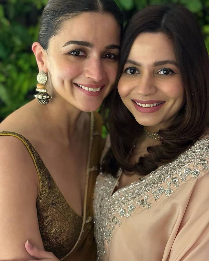 Another photo captures Alia and her sister Shaheen, showing their close sibling bond.