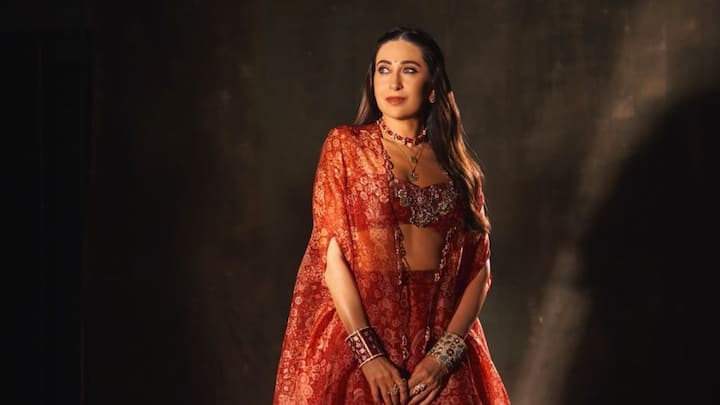 Karisma Kapoor treated fans with pictures in a red ethnic outfit looking her most elegant self. Kapoor looked quite stunning in the co-ord cape set.