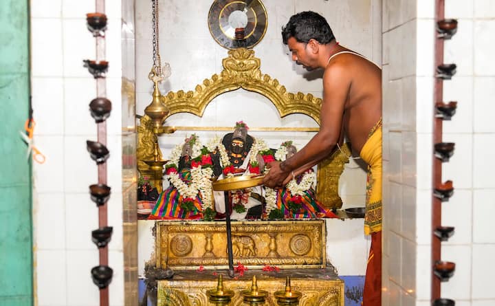 A priest does a special prayer for the victory of Democratic Presidential nominee Kamala Harris in the US election, in Mannargudi, Tamil Nadu, Monday, Nov. 4, 2024.