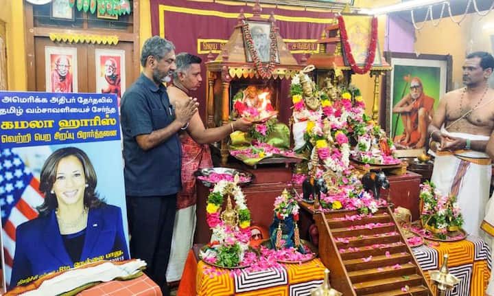 Anushathin Anugraha Chairman Nellai Balu performs 'puja' for the victory of Democratic Presidential nominee Kamala Harris in the US election, in Madurai, Monday, Nov. 4, 2024.