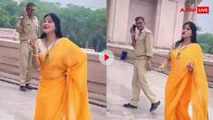 पुलिस वाले के साथ जबरन डांस करने लगी महिला, परेशान हो भाग निकला जवान, देखें वायरल वीडियो