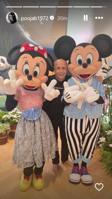 Alia Bhatt's father Mahesh Bhatt is seen in the picture posing with Mickey and Minnie Mouse. (Image: Instagram/@poojab1972)