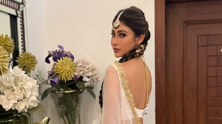 Mouni Roy has successfully made her mark in films and music videos. With her captivating performances and stunning looks, she has become a versatile figure in Indian entertainment.