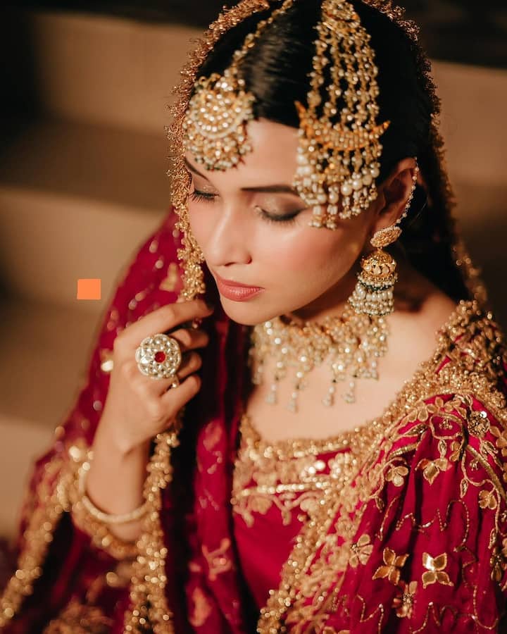 She recently shared pictures as a proper Punjabi bride in a red sharara set with traditional wedding jewellery.