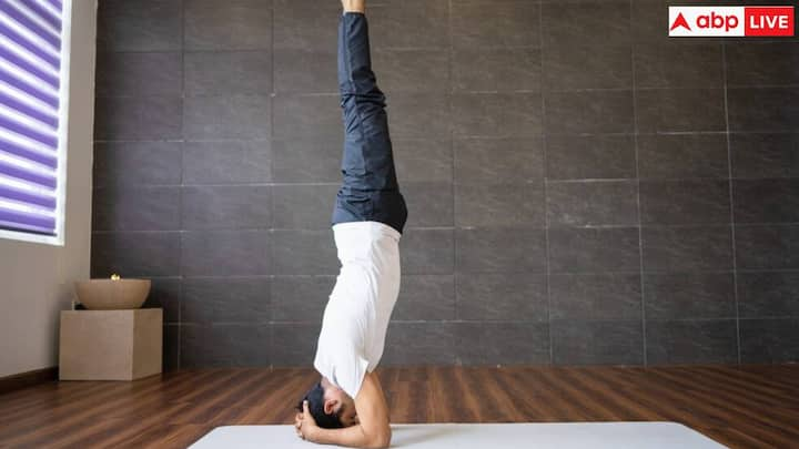 Headstand Tips: बहुत देर तक शीर्षासन करने से शरीर पर क्या असर होगा? आज हम इस आर्टिकल में विस्तार से बात करेंगे.