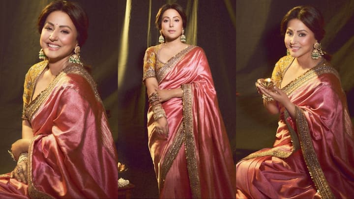 Hina Khan Saree Look: टीवी एक्ट्रेस हिना खान एक बार फिर ट्रेडिशनल लुक में कहर ढहाती हुई नजर आई. एक्ट्रेस ने गुलाबी साड़ी में अपनी कुछ दिलकश तस्वीरें सोशल मीडिया पर शेयर की हैं.