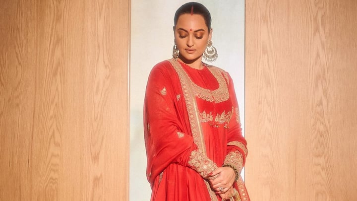 Red Anarkali Suit: Perfect for brides, this dark red Anarkali with golden embroidery is a vision of elegance, especially with a matching dupatta. (Image source: Instagram/ aslisona)
