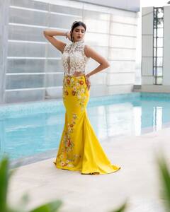 Manchu Lakshmi : వైట్ టాప్​తో హీటెక్కిస్తున్న మంచు లక్ష్మీ.. మెర్మైడ్ డ్రెస్​లో హాట్​గా ఉంది కదూ