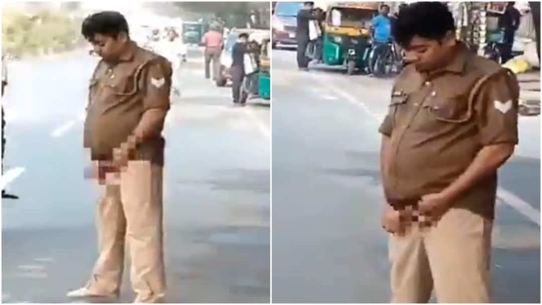 UP Cop ‘Caught In The Act’: Viral Video Shows Officer Peeing On Road UP Cop ‘Caught In The Act’: Viral Video Shows Officer Peeing On Road