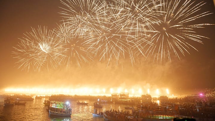 The grand celebration featured nearly 11 lakh lamps on the 84 ghats with Ganga Aarti, laser shows, and green fireworks. (Source: X/@myogiadityanath)