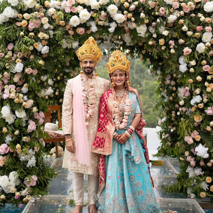 The first image featured the duo beaming as they posed side by side, donning gold crowns.