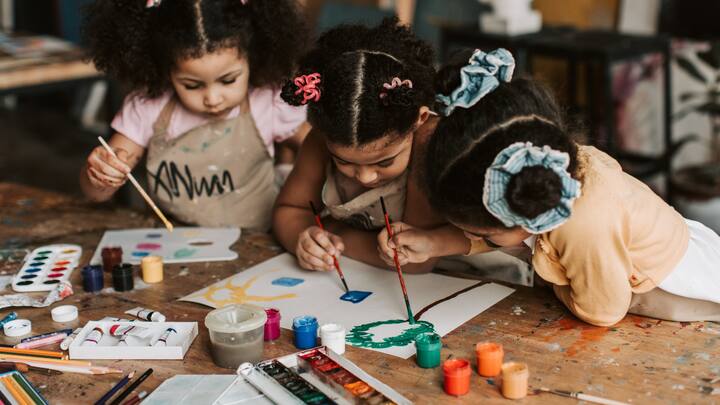 How Mindfulness Alleviates Stress In Children: Mindfulness through play relaxes the body, softening the muscles, focusing on the task at hand, and experiencing the taste of the present moment while having fun. Colouring or painting activities can be a great aid too as they promote creativity as well as critical thinking – as children learn the harmony of colours.  (Image source: Canva)