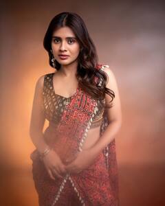 Hebah Patel: ప్యాంటు మీద చీర కట్టిన హెబ్బా... ఫోటోలో ఏముందబ్బా? అన్నట్టు ఆ డ్రస్ రేటెంతో తెలుసా?