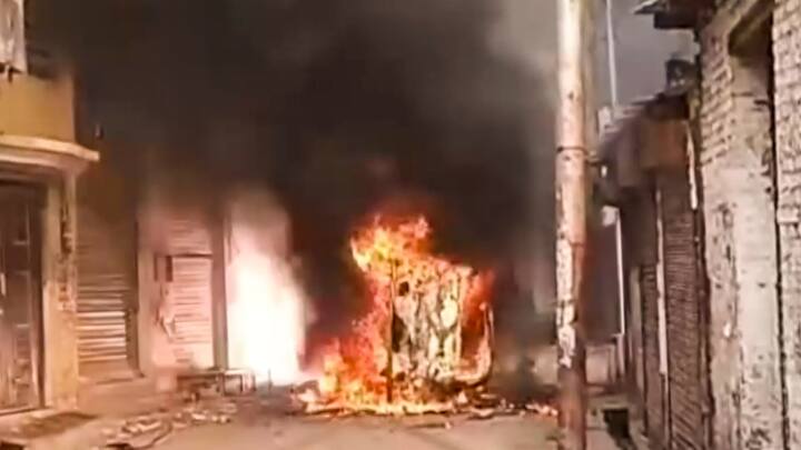 The protesters torched vehicles and pelted the police with stones while the security personnel used tear gas and batons to disperse the mob. (Photo: PTI)