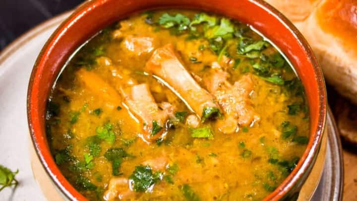 3. Paya Soup: Paya Soup is a flavourful and hearty soup that's made from slow coked goat or lamb trotters. The soup consists of herbs, spices, and a rich broth that gives us nourishment. (Image Source: Pinterest/recipe52)