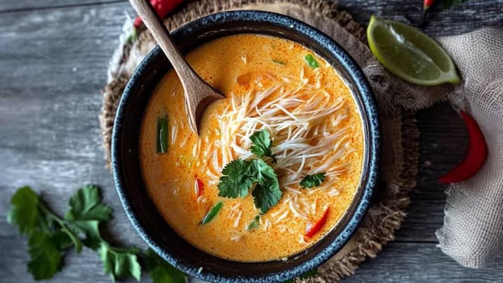 4. Thai Coconut Curry Soup: This soup provides a rich, creamy, and flavourful dish that's made with coconut milk, curry spices, and vegetables. Thai Coconut Curry Soup is a tasty way to increase protein intake. (Image Source: Pinterest/gourmetmartha)
