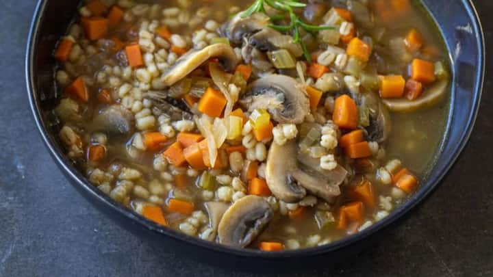 5. Mushroom Barley Soup: Mushroom Barley Soup is a flavourful dish that combines mushroom and tender barley. This soup is packed with fibre and nutrients, making it the perfect and satisfying winter meal. (Image Source: Pinterest/momsdish)