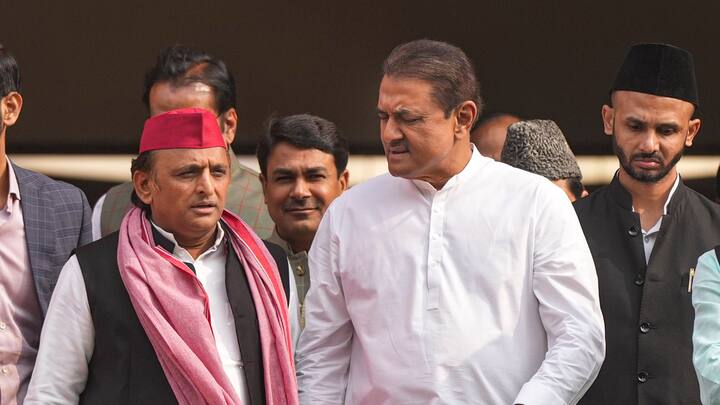 Samajwadi Party MP Akhilesh Yadav and NCP MP Praful Patel during the first day of the Winter session of Parliament. (Photo: PTI)