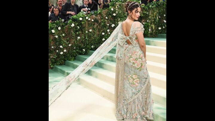 6. Dreamy Floral Saree: This pastel floral saree redefines fusion fashion with its intricate embroidery and cape-style pallu. Alia has given the traditional Indian saree a glamorous twist, transforming it into a modern fairytale outfit. (Image Source: Instagram/@aliaabhatt)