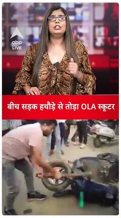 Shocking video: Breaks his scooter with a hammer outside a shop, video goes viral