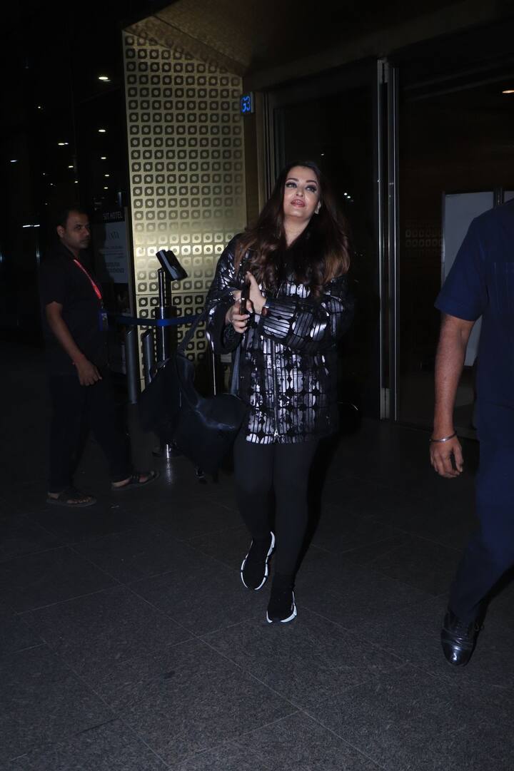 Once again Aishwarya Rai is being trolled because of her airport look. In the pictures, the actress is seen wearing a big size black and gray jacket with full sleeves. On which sparkle golden detailing work was done.