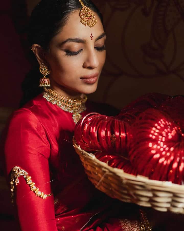 Skipping the usual pre-wedding parties, Sobhita embraced a deeply traditional approach to her wedding. She began the journey in October with the goduma raayi pasupu danchadam ceremony, symbolizing the start of wedding preparations.