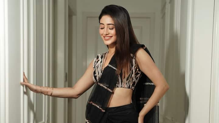 Shivangi Joshi treated fans with pictures in a black and silver saree looking her most stylish self.