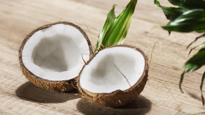 7. Coconut: Coconut is used in various forms like grated, coconut milk, and oil. It adds richness, flavour, and texture to all the South Indian dishes. It's a main ingredient of all the South Indian cuisines. (Image Source: Canva)