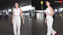 व्हाइट क्रॉप टॉप के साथ मैचिंग ट्राउजर में एयरपोर्ट पर स्पॉट हुईं अनन्या पांडे, सिंपल लुक में भी लगीं बेहद हसीन
