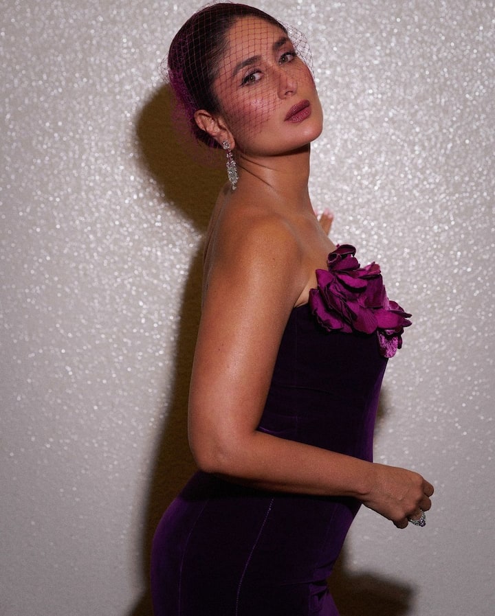 Her hair was styled in a sleek, classic bun, exuding grace and sophistication.
