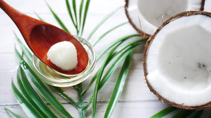 6. Coconut Oil: Coconut Oil is rich in fatty acids and helps in deeply hydrating the skin. It forms a protective barrier to lock in the moisture during the cold months. (Image Source: Canva)