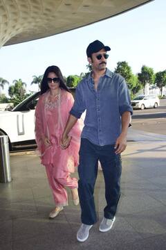 विक्की कौशल का हाथ थाम एयरपोर्ट पहुंचीं कैटरीना कैफ, पिंक सूट और काले चश्मे में फ्लॉन्ट किया देसी लुक, देखें तस्वीरें