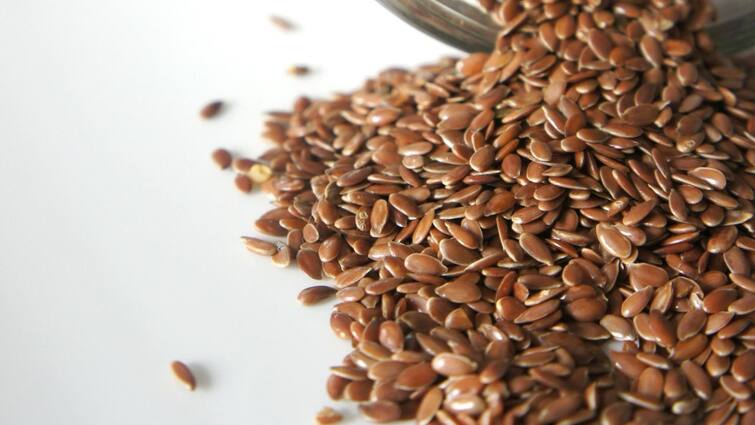 Flaxseed Side Effects What happens if you eat too much flaxseed Flaxseed Side Effects: রোজ ফ্ল্যাক্সসিড খান? প্রয়োজনের তুলনায় বেশি হচ্ছে না তো? হতে পারে এইসব সমস্যা