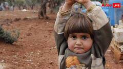 सीरिया में जब कैमरे को बंदूक समझकर सहम गई थी चार साल की बच्ची, वायरल फोटो ने पूरी दुनिया को कर दिया था सन्न