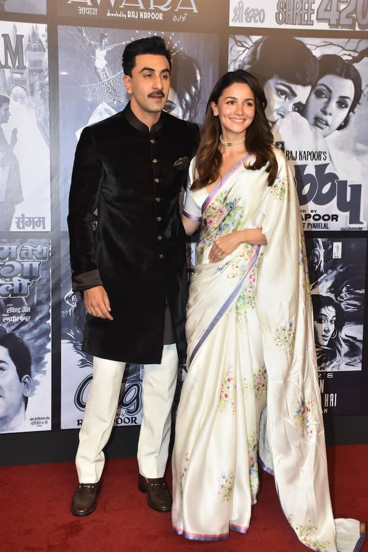 Ranbir looked effortlessly charming in a black bandhgala sherwani. Alia, on the other hand, exuded grace in a white floral saree.