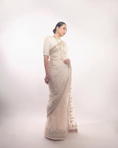 Karisma Kapoor Is A Picture Of Radiance In White Sabyasachi Saree At Raj Kapoor's 100th Birth Anniversary Event