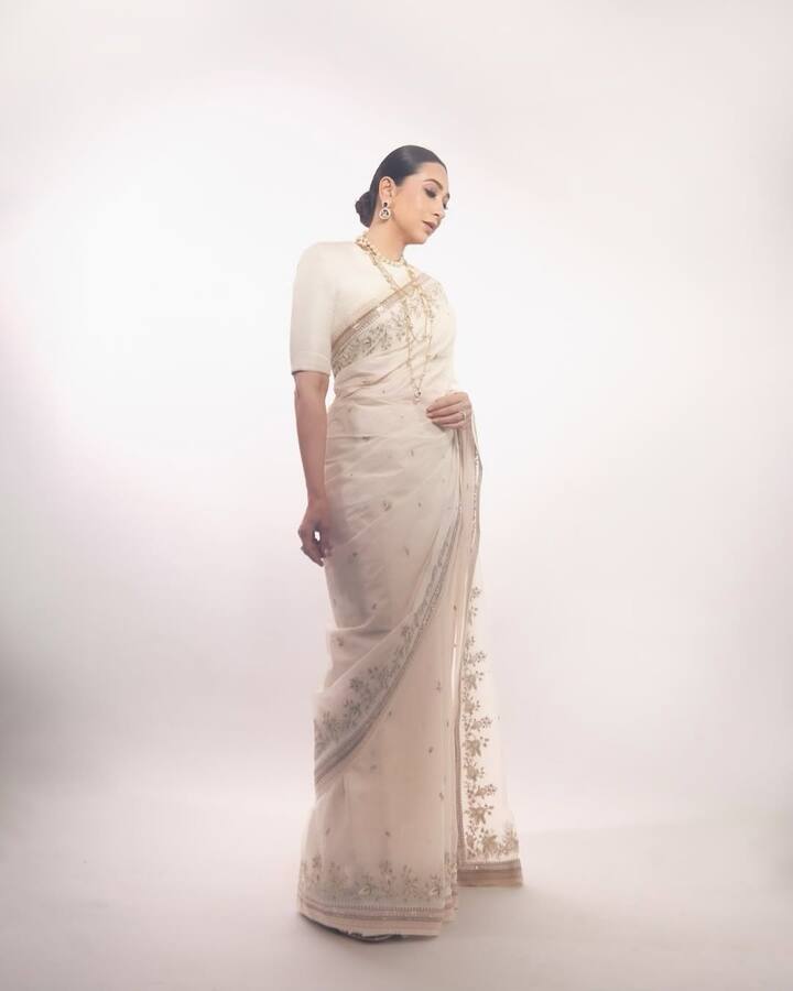 Karisma looked elegant in a white Sabyasachi saree giving the most ethereal vibe.
