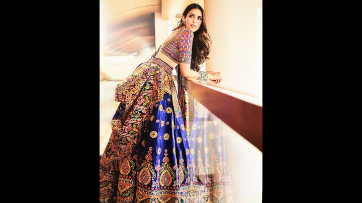 7. Traditional And Contemporary Charm: Shloka Ambani looks glamourous in her traditional ghahra. Her outfit has been adorned with multicolour resham embroidery and highlighted with mirrors and stones which elevates the ensemble to a truly exquisite level. (Image Source: Instagram/@abujanisandeepkhosla)
